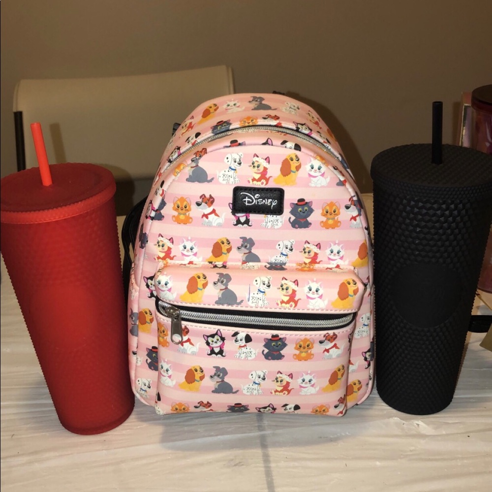 Loungefly Disney cats and dogs book bag